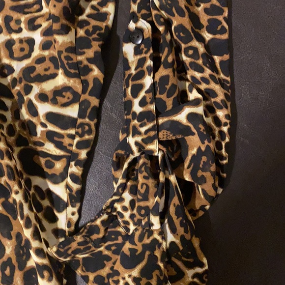 Cheetah print chiffon long sleeve blouse. Button details on sleeve - Picture 3 of 3